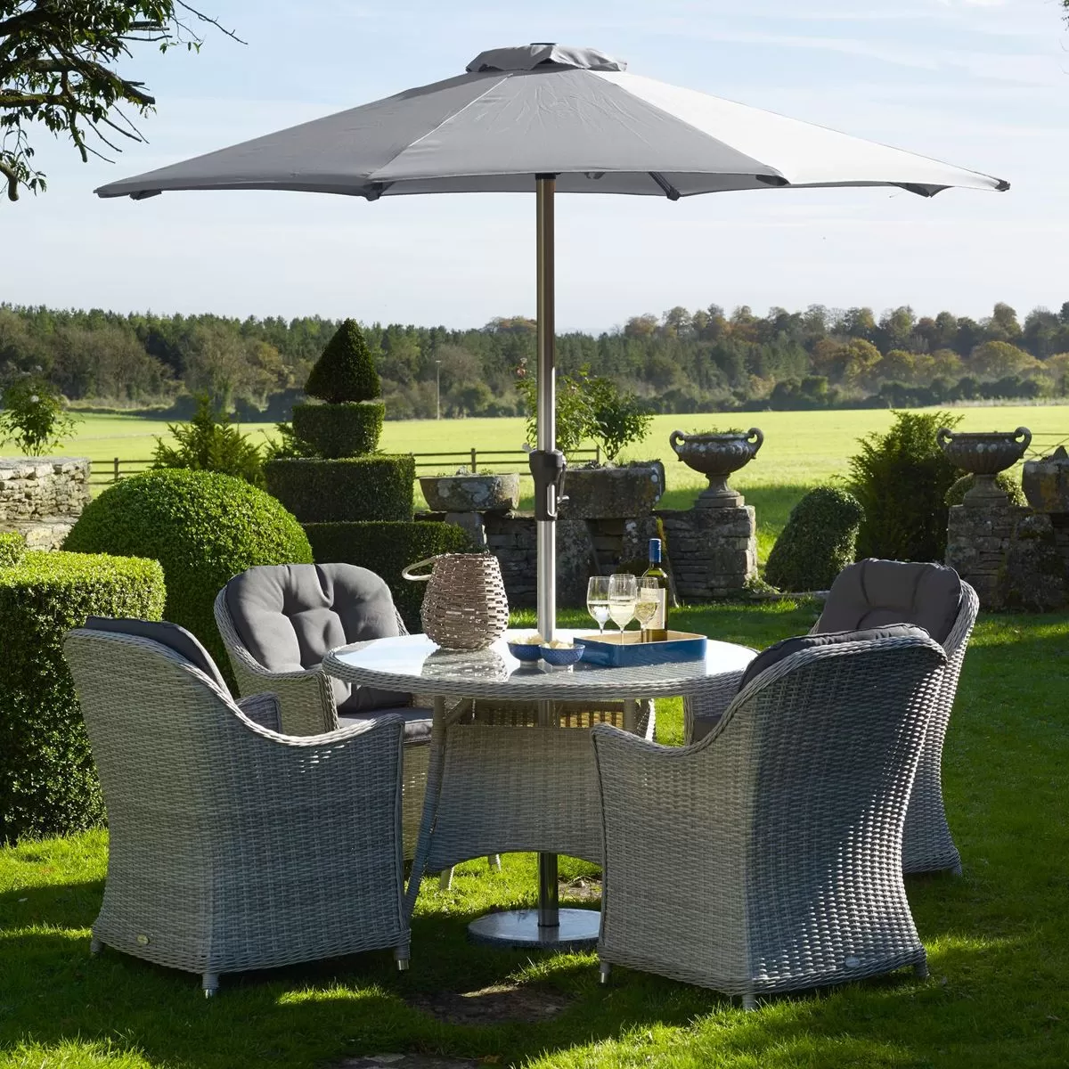 Bramblecrest Monterey 4 Seater Round Dining Set & Parasol 3 Bramblecrest Monterey 4 Seater Round Dining Set & Parasol - Image 3